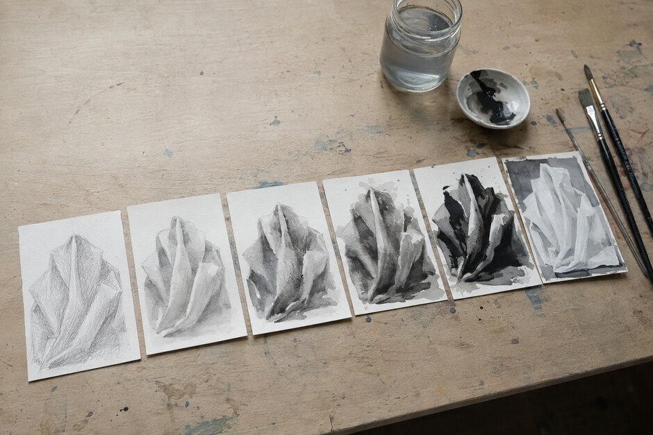 Six studies of the same folded form moving from graphite through ink and opaque paint.